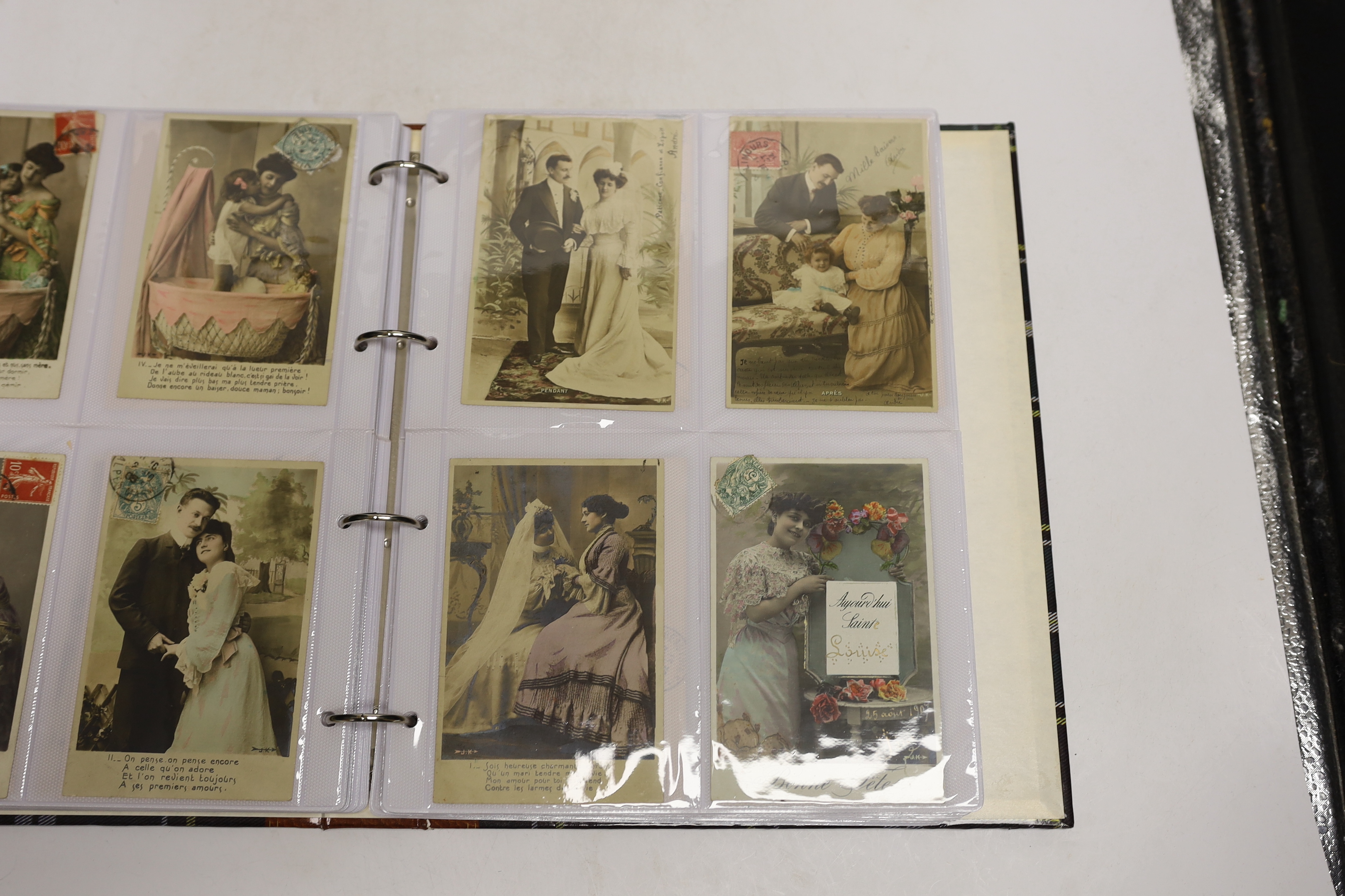 A large quantity of postcards, 940 total in three albums, all French, early 20th century